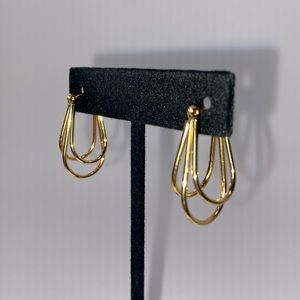 Gold Tone Triple Hoop Earrings. 1.25 inches Long & .5 inches wide.